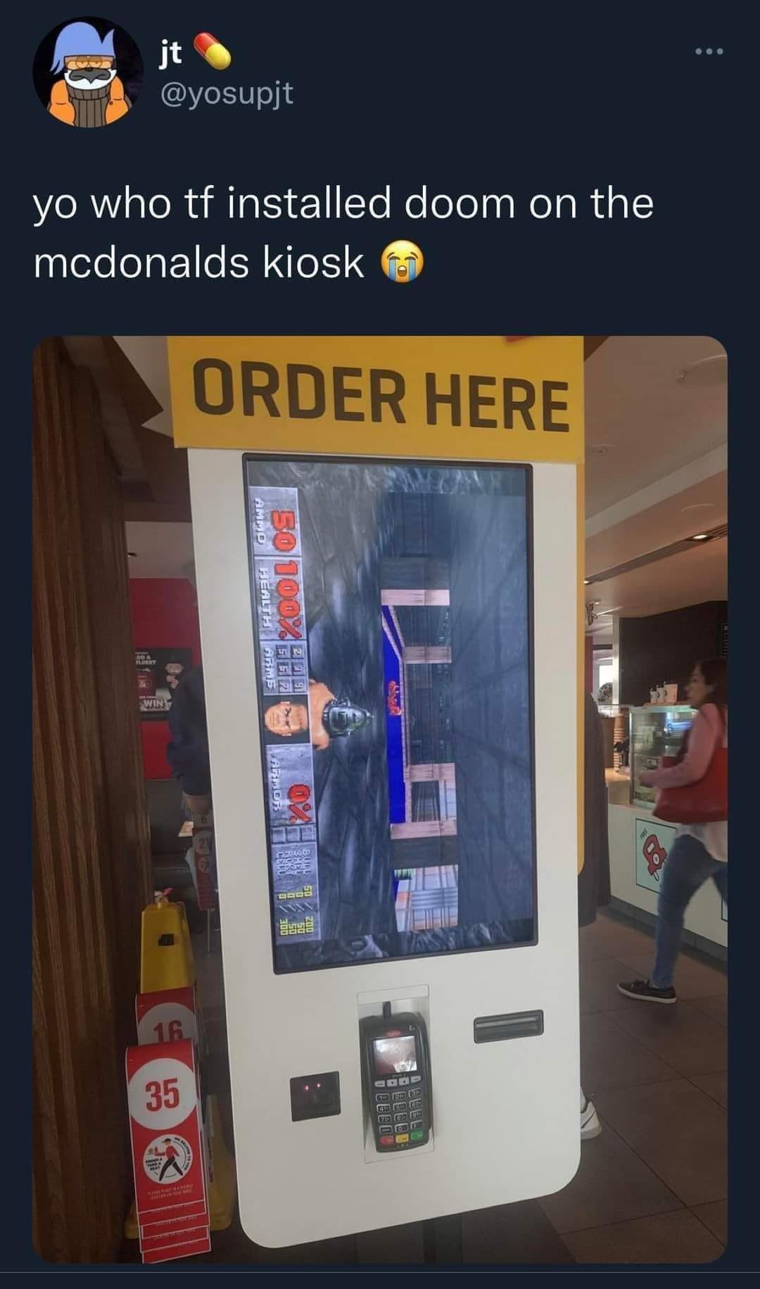 Someone installed Doom on a McDonald's Kiosk. That's one way to stop self-checkouts from taking jobs!